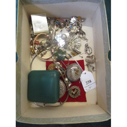 258 - A box of silver rings, earrings etc.