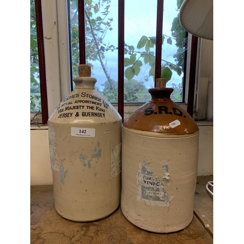142 - A vintage salt glazed stone ware jogue inscribed 