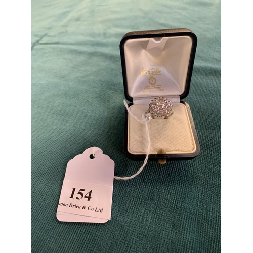 154 - A 9 carat white gold cluster ring size P