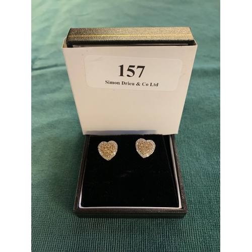 157 - A pair of white and champagne gold earrings set with multiple diamonds (approximately 1 carat) and m... 