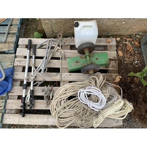 37 - Several lengths of rope, two outboard engine tiller extensions, galvanised anchors, rollocks etc.