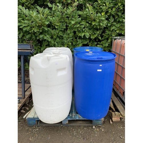 63 - Four plastic 205 litre barrels