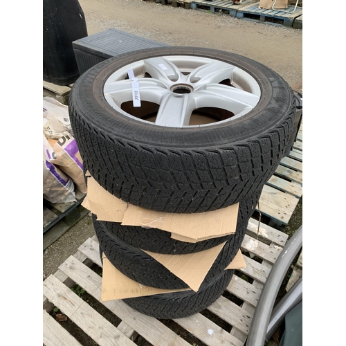 67 - A set of four Porsche Cayenne aluminium wheels and tyres 255/55R 18