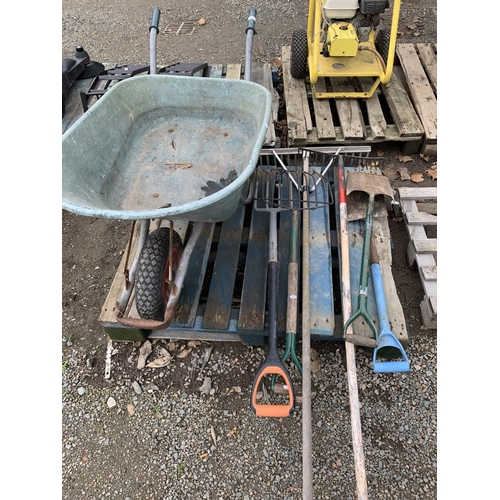 83 - A garden wheel barrow together with various gardening hand tools