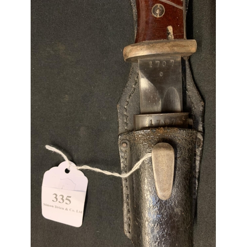 335 - A German World War II K98 bayonet and scabbard (matching numbers)