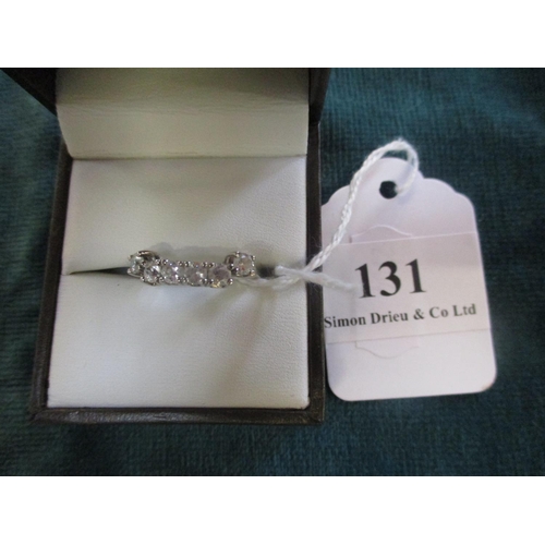 131 - A 9 carat white gold ring (size L)