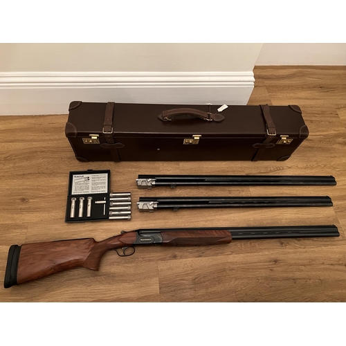 153 - A Perazzi MX2000 S over and under 12 gauge shotgun with three sets of Teague choked barrels (34