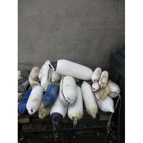 30 - A varied accumulation of boat fenders