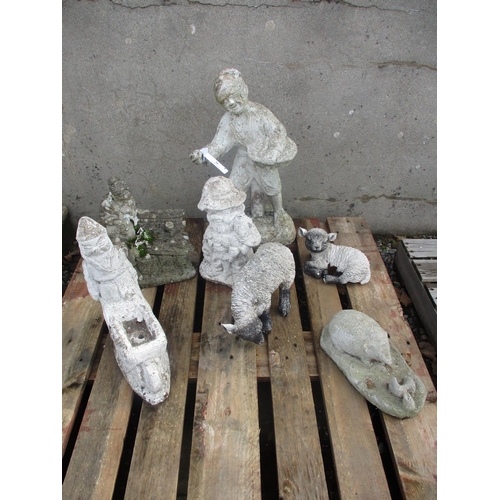 34 - Seven assorted reconstituted stone and other garden models