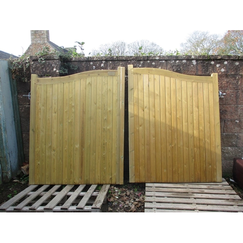 62 - A pair of Jacksons tanalised tongue and groove entrance way gates (approx 10' span) new and unused