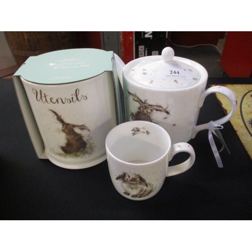 244 - A Royal Worcester Hare teapot together with a matching utensils pot and mug