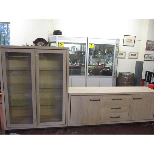 247 - A contemporary limed oak sideboard together with a matching glazed and illuminated display cabinet