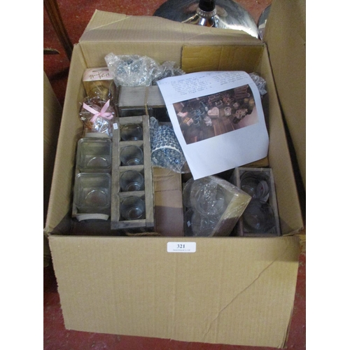 321 - A box containing a variety of new gifts and retail items