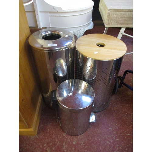 326 - A Brabantia chrome pedal bin together with two similar linen baskets