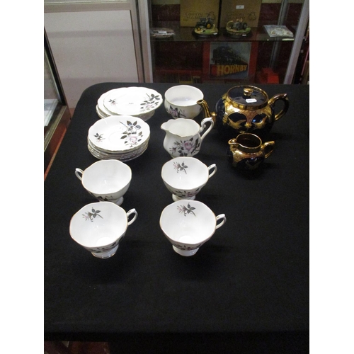 345 - A Royal Albert part tea service together with a lustre teapot and milk jug