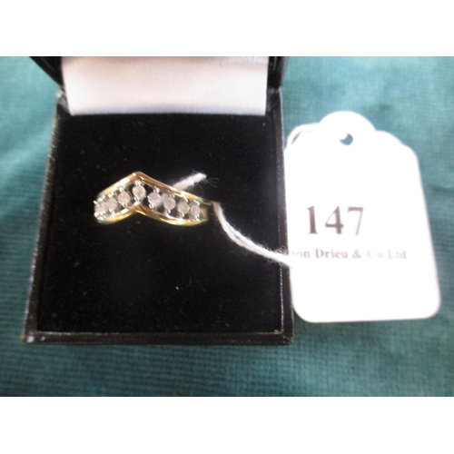 147 - A chevron shaped 9 carat gold dress ring containing diamonds (1/4 carat) size N