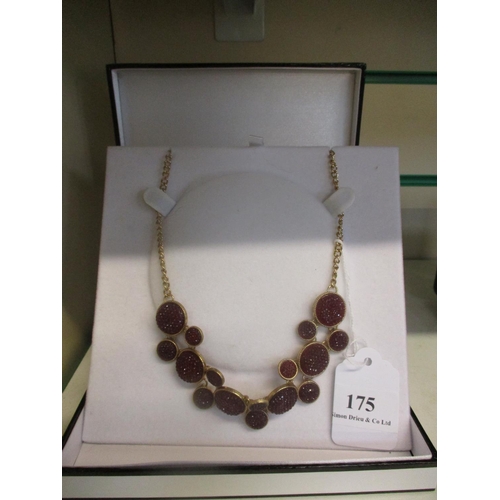 175 - A multi red stone necklace