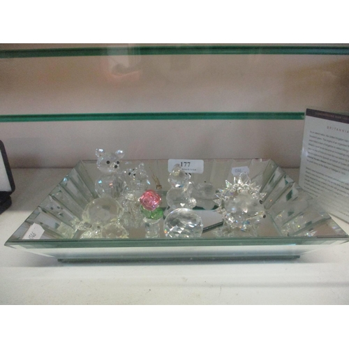 177 - A collection of Swarovski lead crystal models together with a Laura Ashley glass tray