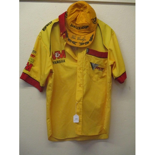 218 - A V&M Yamaha short sleeved shirt (size L) together with a Dunlop peaked cap signed by Steve Hislop