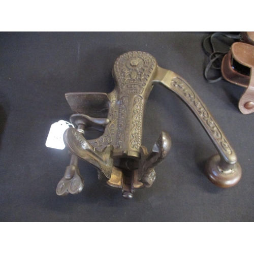 252 - A counter mounted bottle opener modelled in the Victorian style