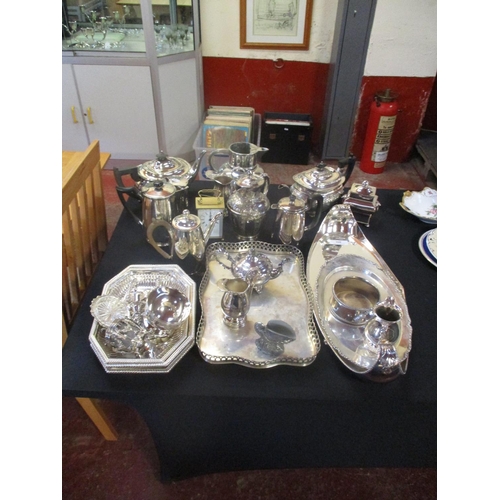 260 - Assorted silver plated ware, a pewter jug, a carriage clock etc.