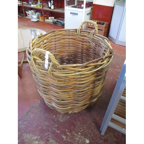 263 - A circular twin handled bamboo basket of gigantic proportion