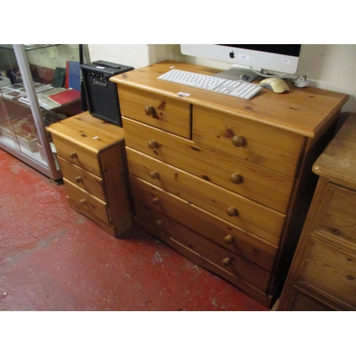 445 - A pine chest of two short over four long drawers together with a matching three drawer bedside chest