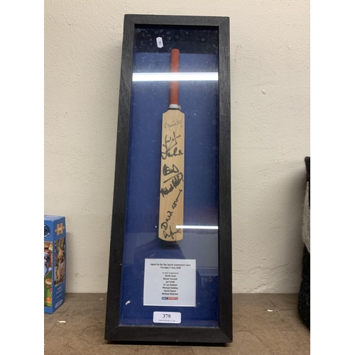 379 - A signed miniature cricket bat by the Sky Sports Commentary team 2008