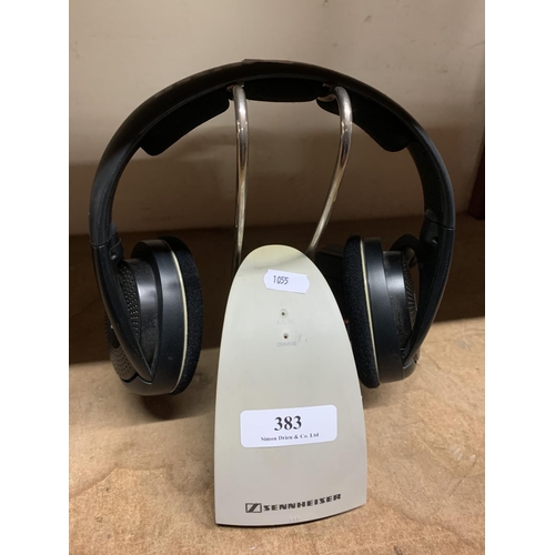 383 - A set of Sennheiser cordless headphones and stand