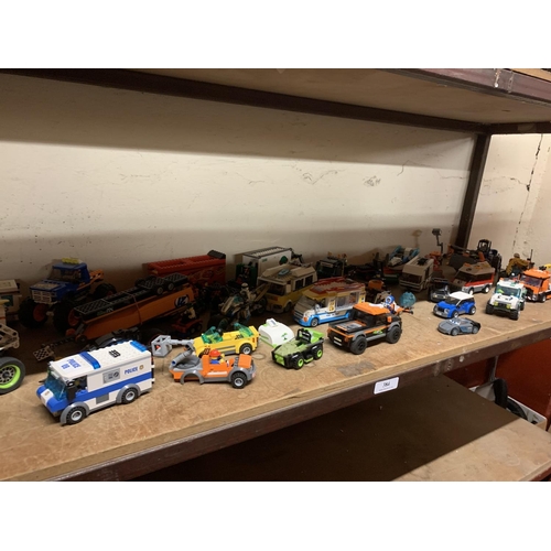 384 - A large quantity of Lego vehicles, figures etc.