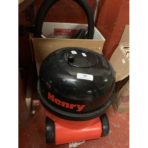 389 - A Henry vacuum cleaner and accessories