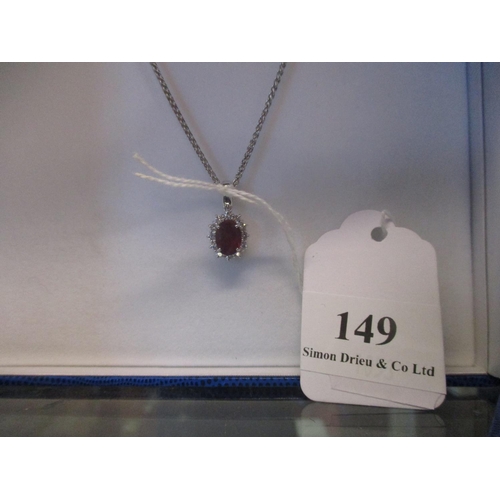 149 - An 18 carat white gold ruby and diamond pendant (ruby 2.43 carat, diamond 0.36 carat)