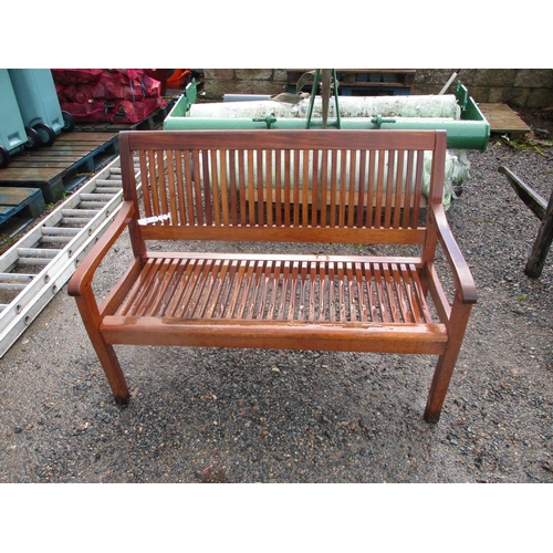 26 - A teak garden bench