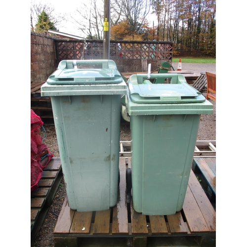 31 - Two green wheelie bins