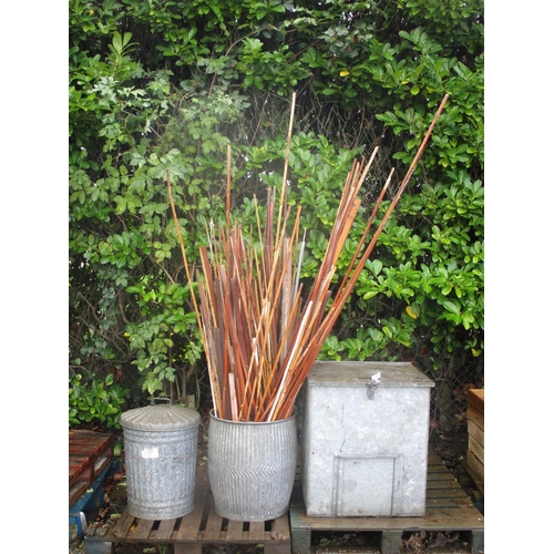 51 - A galvanised coal bunker, a galvanised dustbin, a galvanised wash barrel and a quantity of bamboo