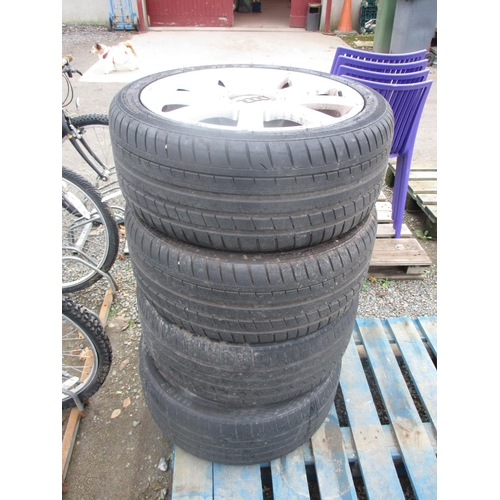 57 - A set of four Audi aluminium wheels and tyres 235/40R18