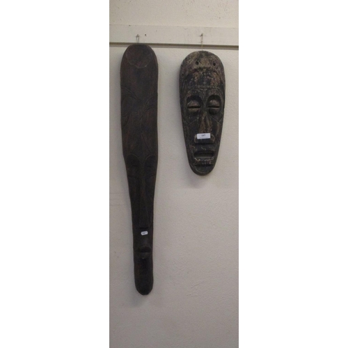 197 - Two carved African face masks