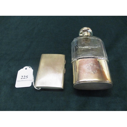 225 - A gentleman's glass hip flask with silver mounts together with a silver cigarette case with engine t... 