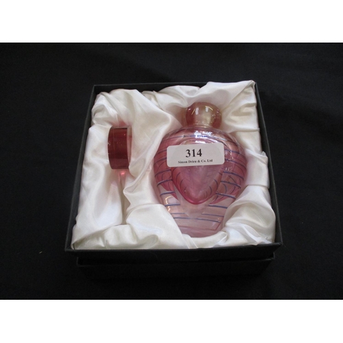 314 - A pink glass perfume bottle