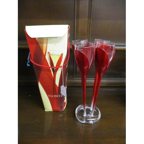 321 - A Moet & Chandon flower champagne drinking set