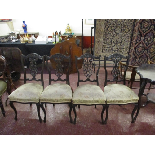 239 - An Edwardian walnut centre table together with a set of four Edwardian walnut salon chairs and a pai... 