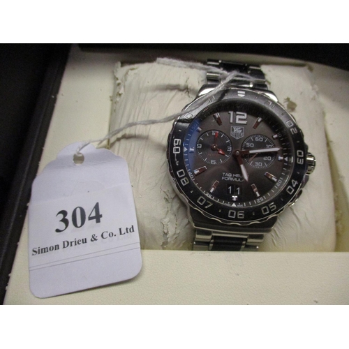 304 - A gentleman's Tag Heuer Formula One chronograph wrist watch