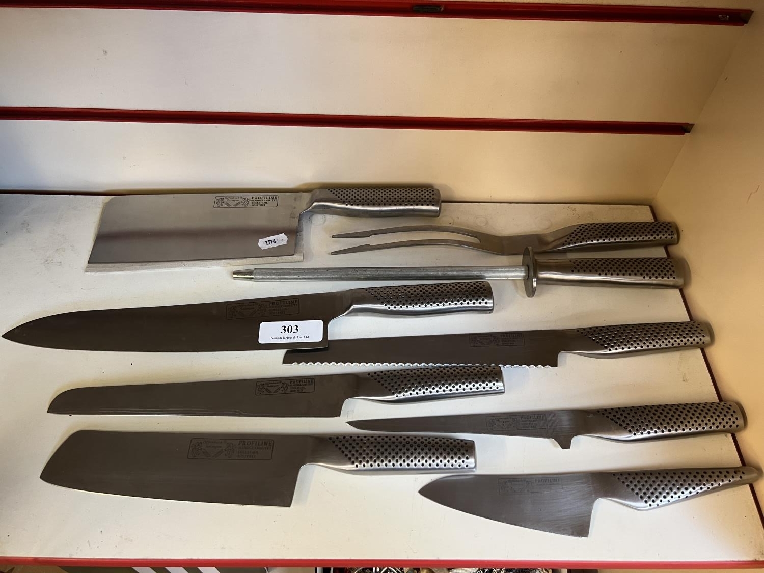 A set of Profiline chef's knives and accessories