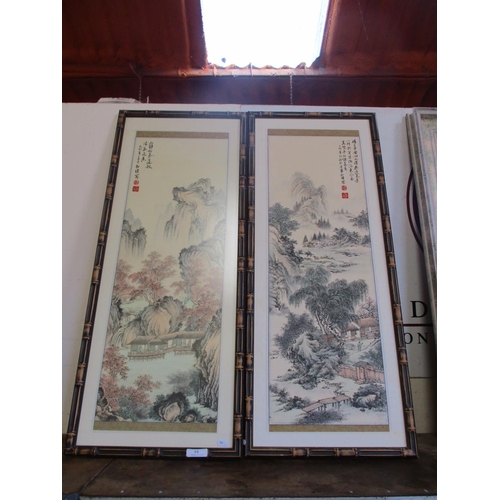 64 - A pair of Chinese scroll pictures mounted within simulated bamboo frames