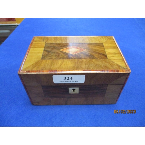 324 - A parquetry inlaid jewellery chest