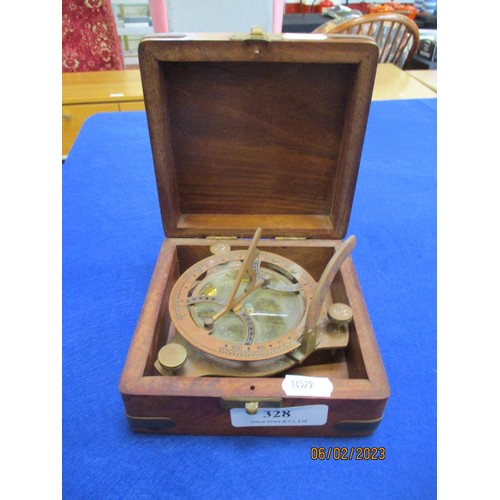 328 - A brass compass in mahogany brass bound box modelled in the vintage style