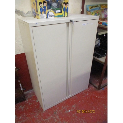 284 - A metallic two door office cabinet