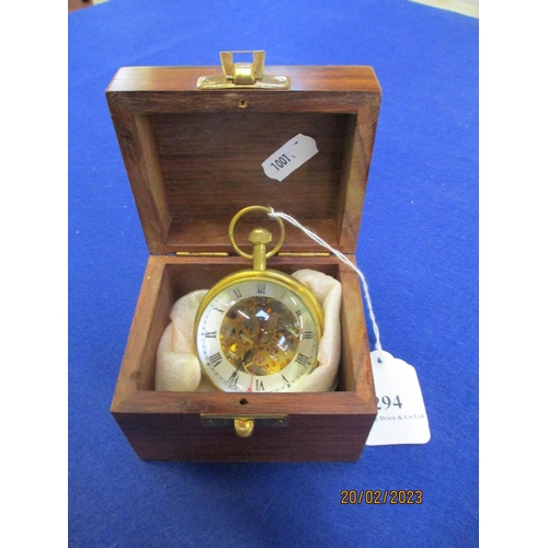 294 - A brass magnified pocket watch paper weight