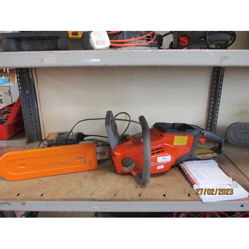 108 - A Husqvarna battery operated chainsaw complete with charger