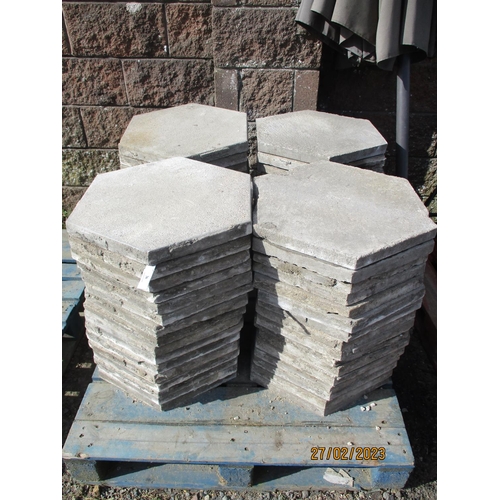 36 - Sixty four hexagonal grey coloured paving slabs